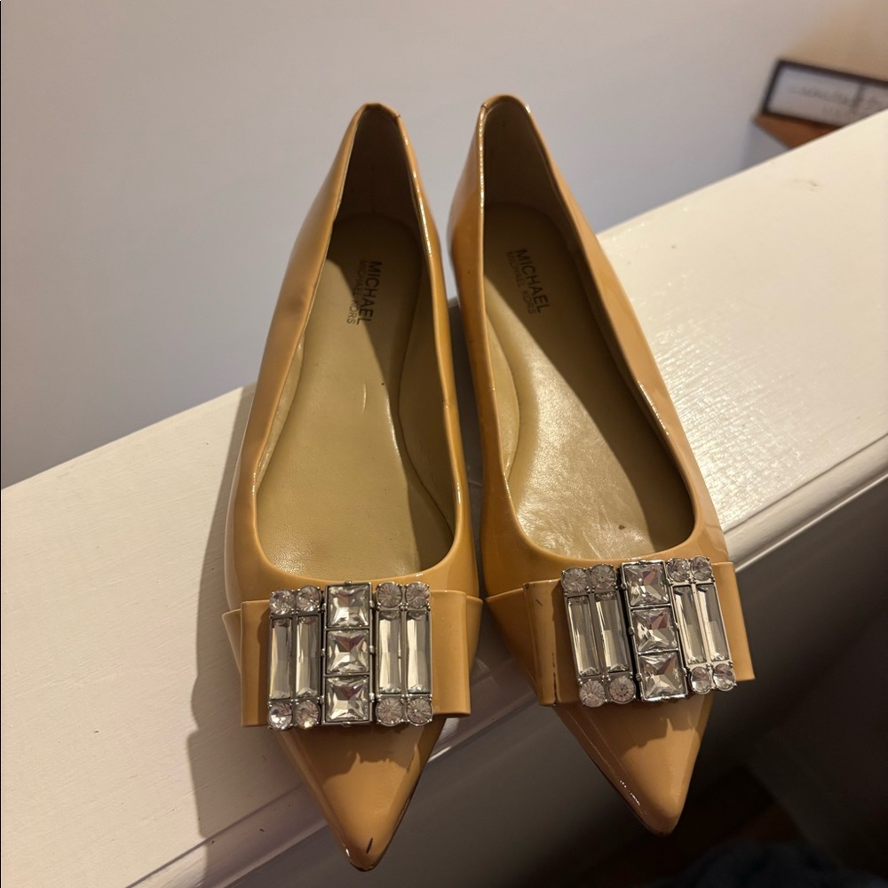 Michael Kor’s flats